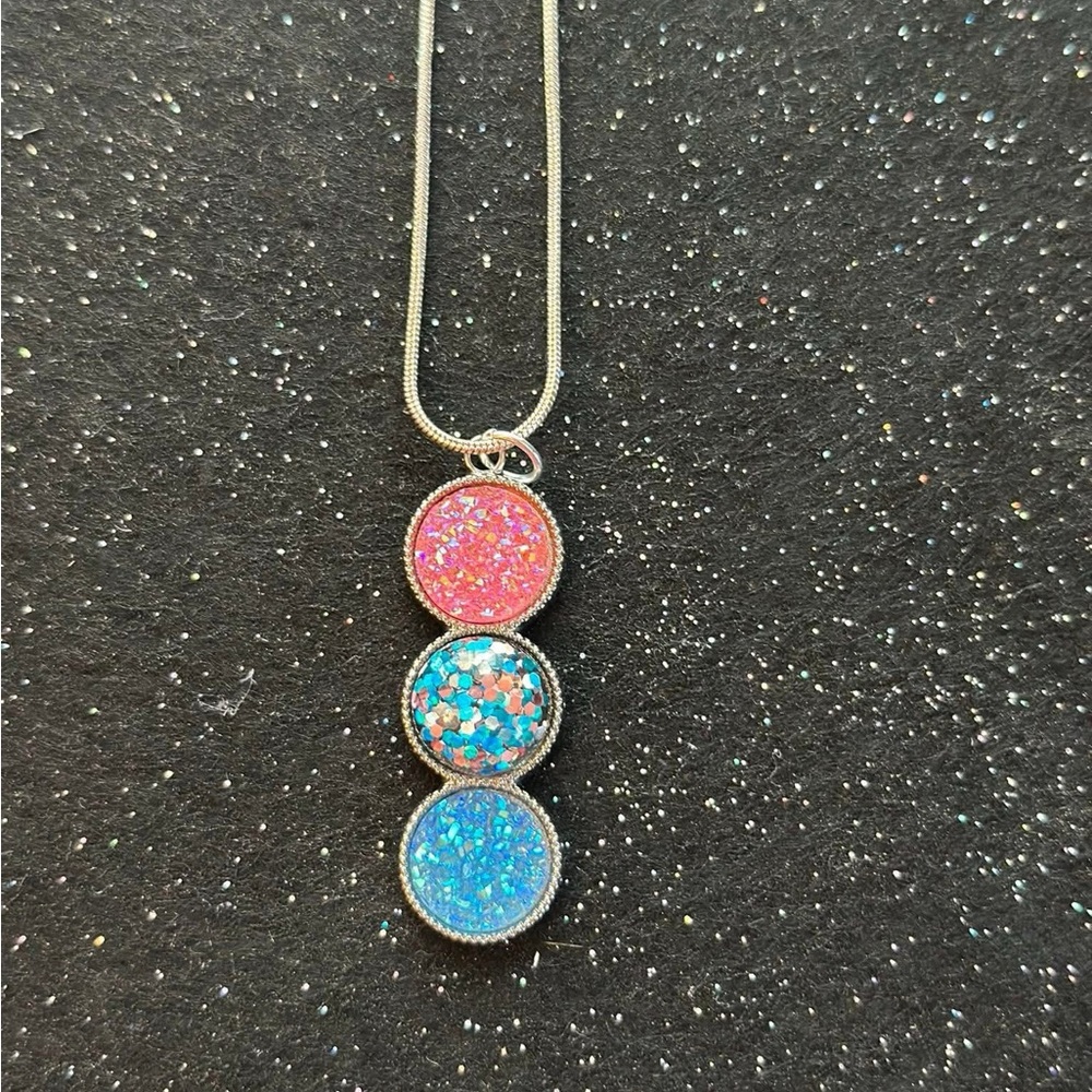 Elegant Silver Necklace with Pink and Blue Accents